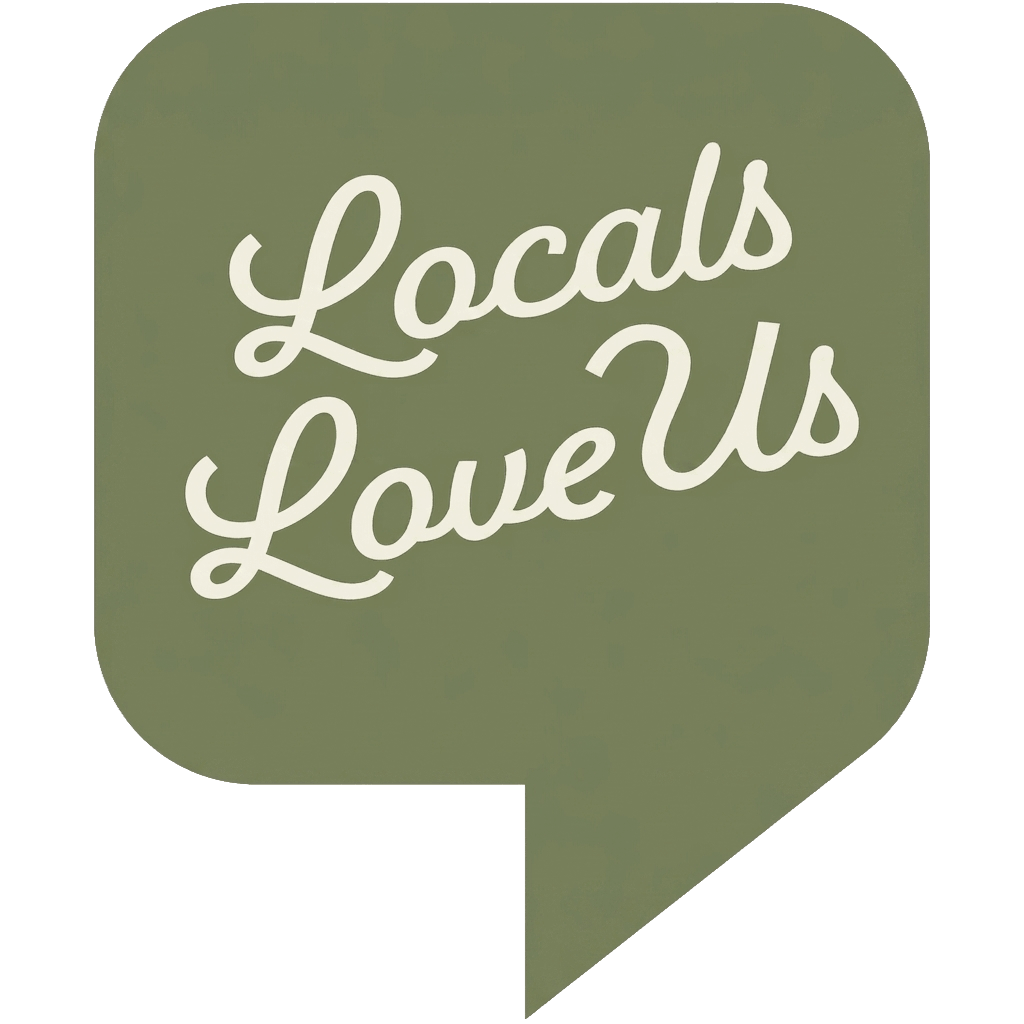 Olive green speech bubble icon with the white text “Locals Love Us.” - Salon Aria + Spa in Davenport, IA